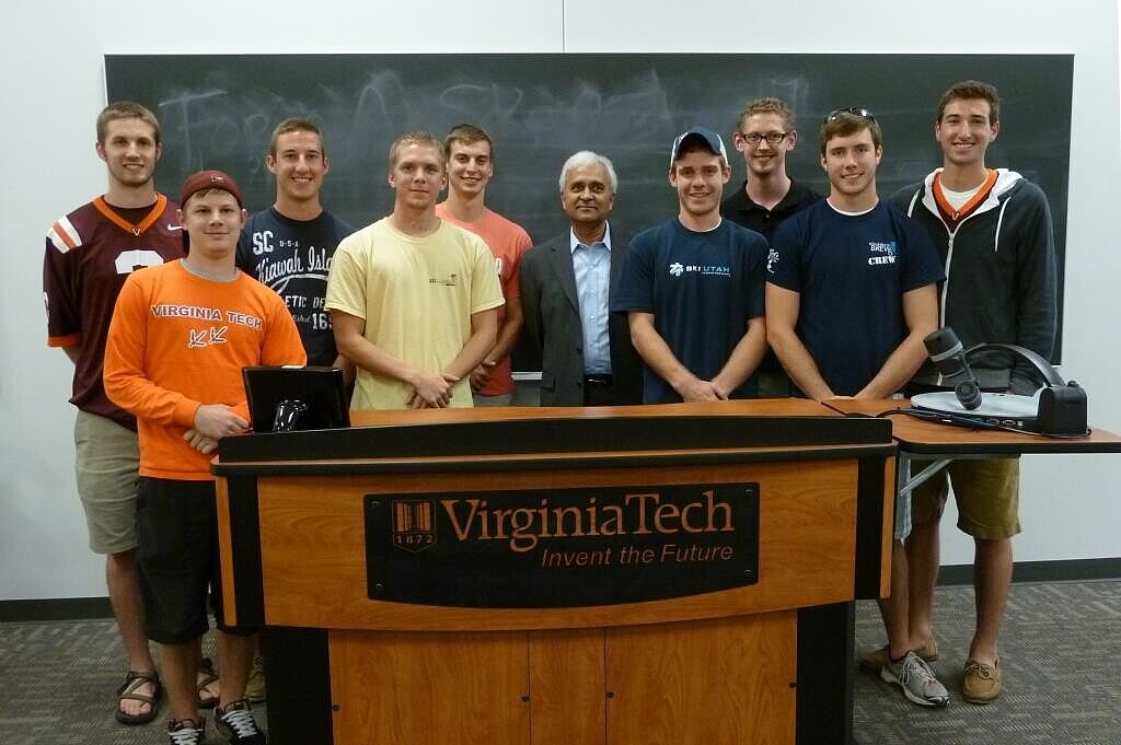 Group of students with professor in a classroom